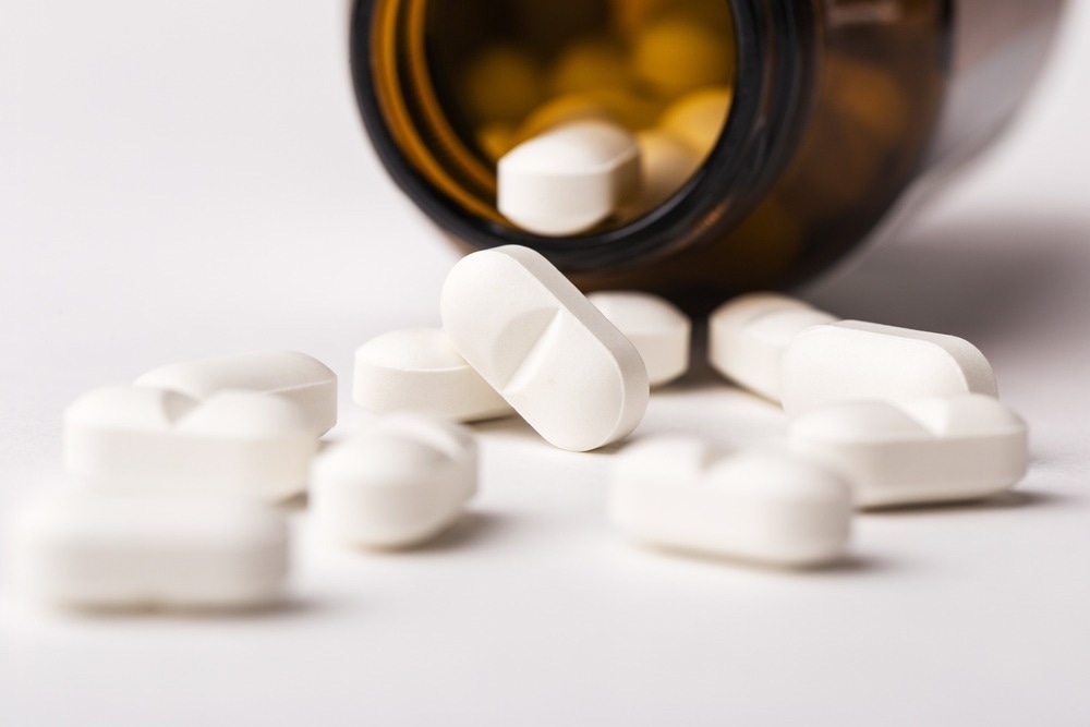 Close up magnesium supplements fell out of a glass bottle on a white background. Image Credit: Gala Oleksenko/Shutterstock.com Close up magnesium supplements fell out of a glass bottle on a white background. Image Credit: Gala Oleksenko/Shutterstock.com