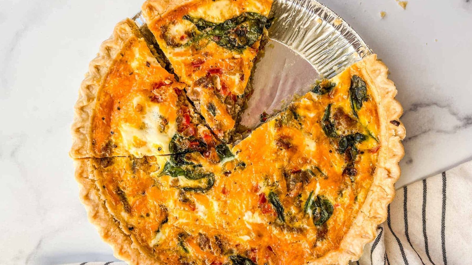 Breakfast Quiche in a tin baking pan.