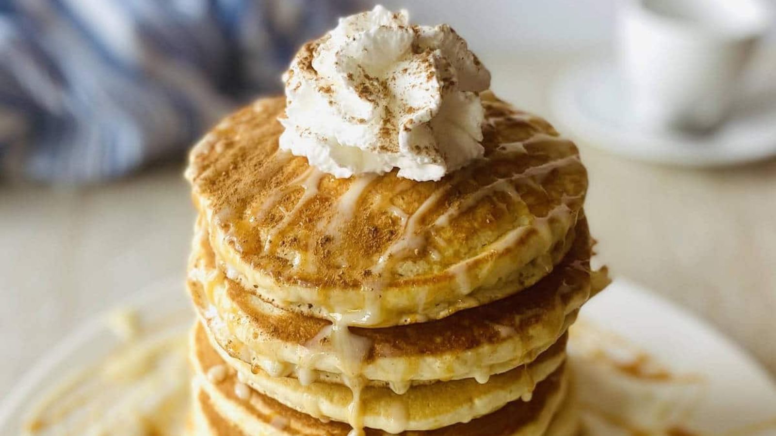 Tres Leches Pancakes on a white plate.