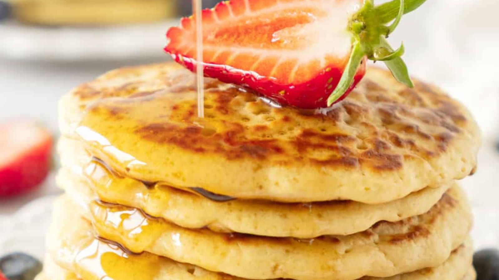 Cornmeal Pancakes stacked on each other.