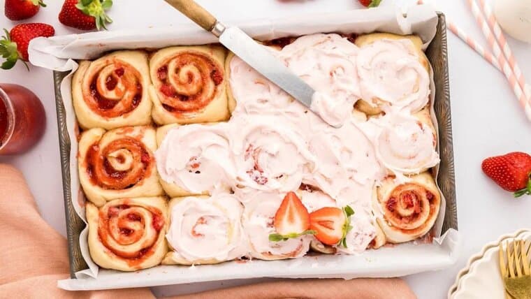 Strawberry Cinnamon Rolls in a baking pan.