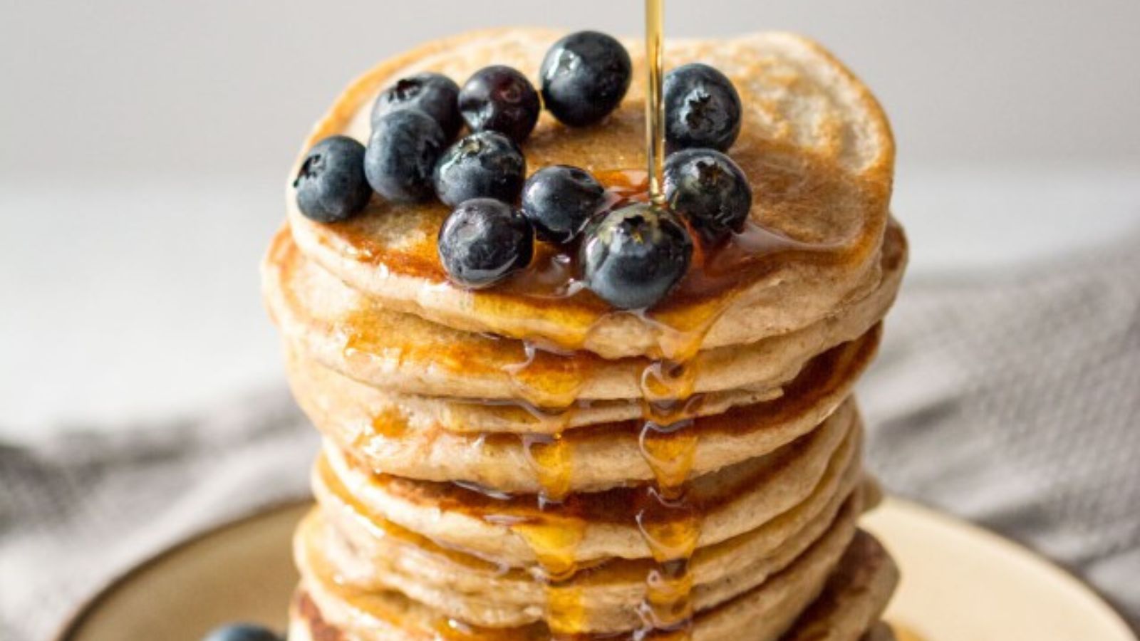 Healthy Banana Pancakes stacked on each other.