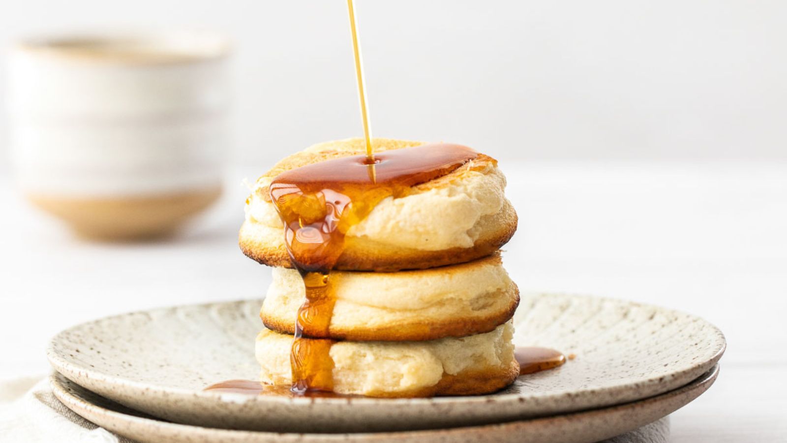 Fluffy Japanese Pancakes stacked on a plate.