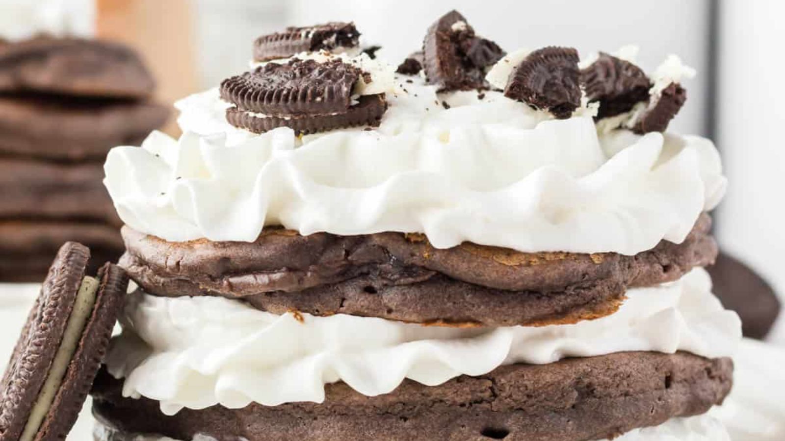 Oreo Pancakes stacked on each other.