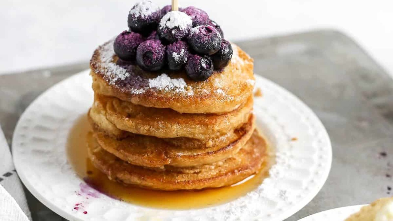 Mini Silver Dollar Pancakes on a white plate.